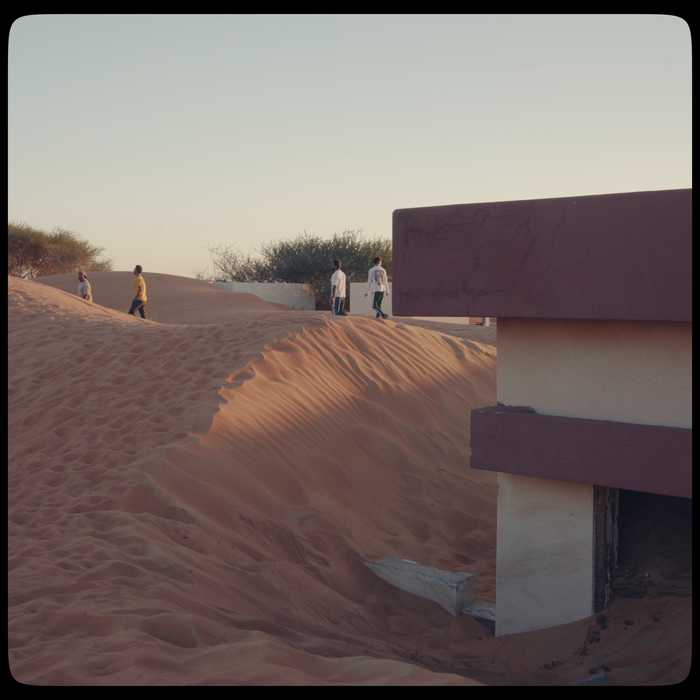 Al Madam village sunken in sand dunes